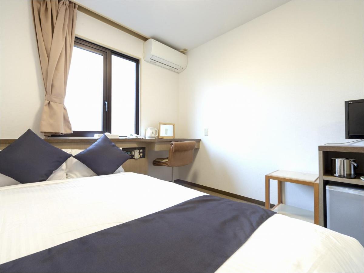 Business Hotel Yanagi Kitakyushu Kokura Esterno foto