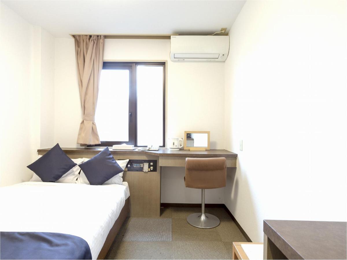 Business Hotel Yanagi Kitakyushu Kokura Esterno foto