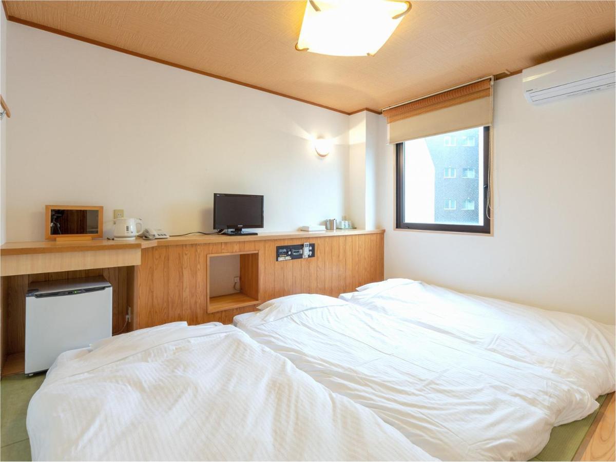 Business Hotel Yanagi Kitakyushu Kokura Esterno foto