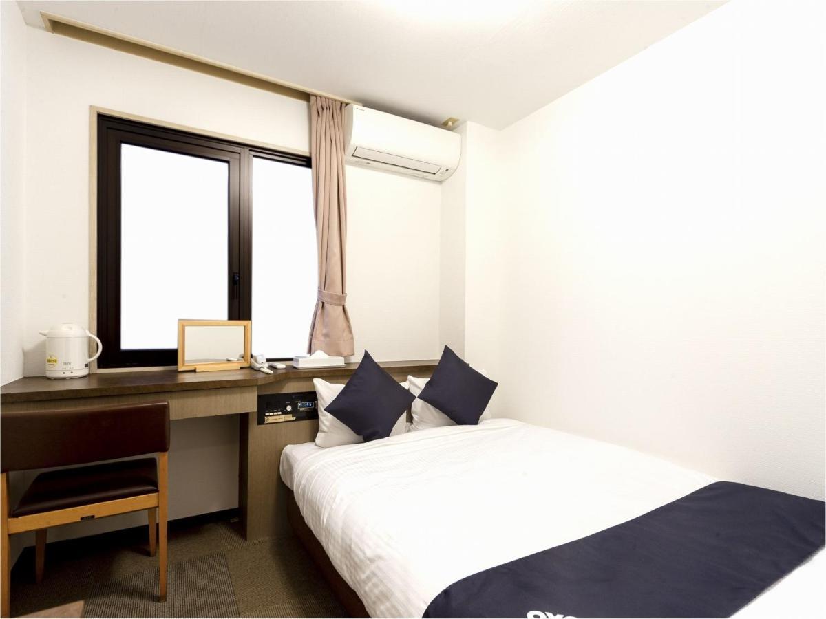 Business Hotel Yanagi Kitakyushu Kokura Esterno foto