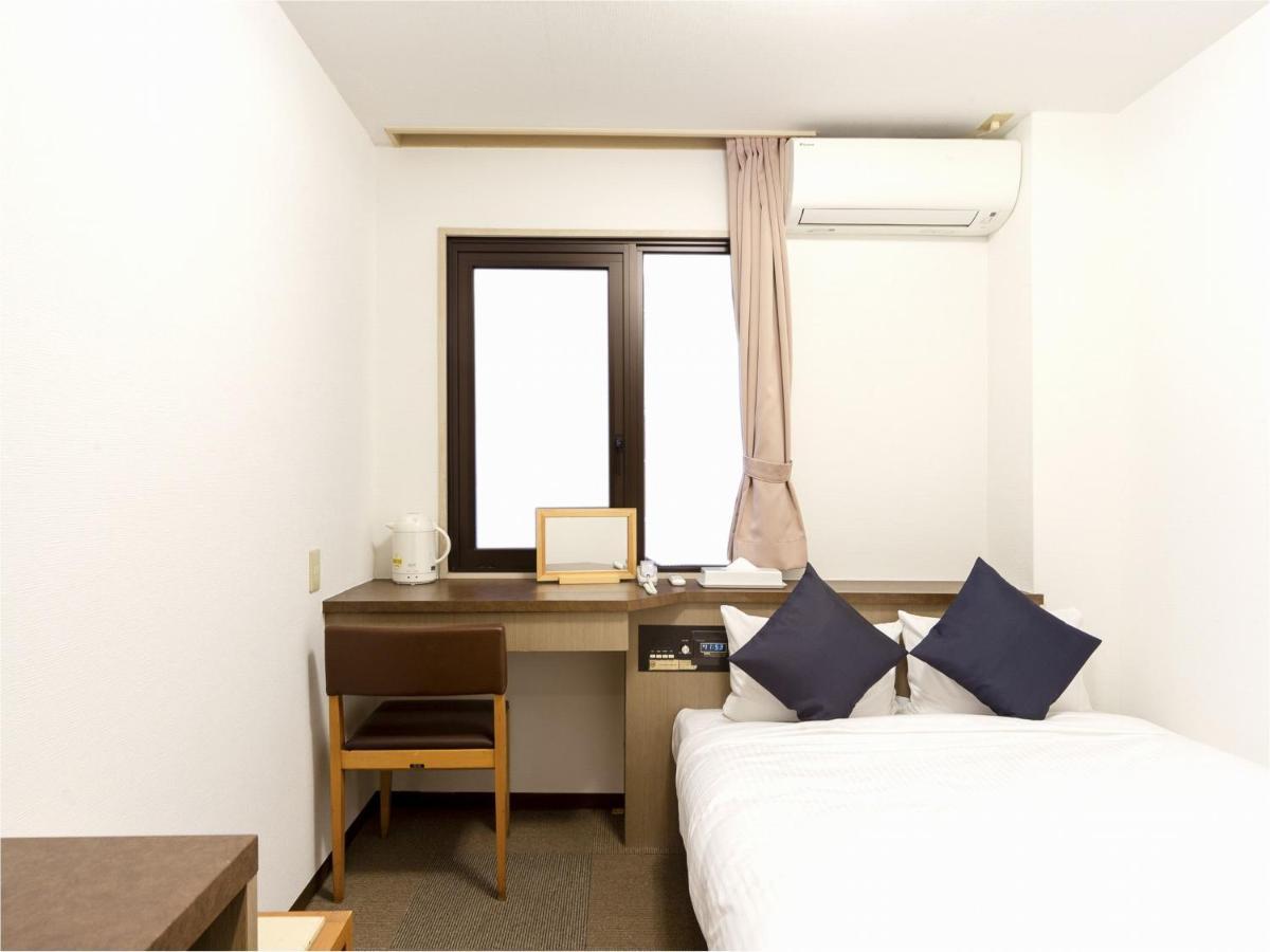 Business Hotel Yanagi Kitakyushu Kokura Esterno foto